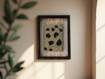 Framed Handmade Moroccan Rug Art – Cream Wool with Black Dots – Berber Textile Wall Hanging – Modern Boho Decor