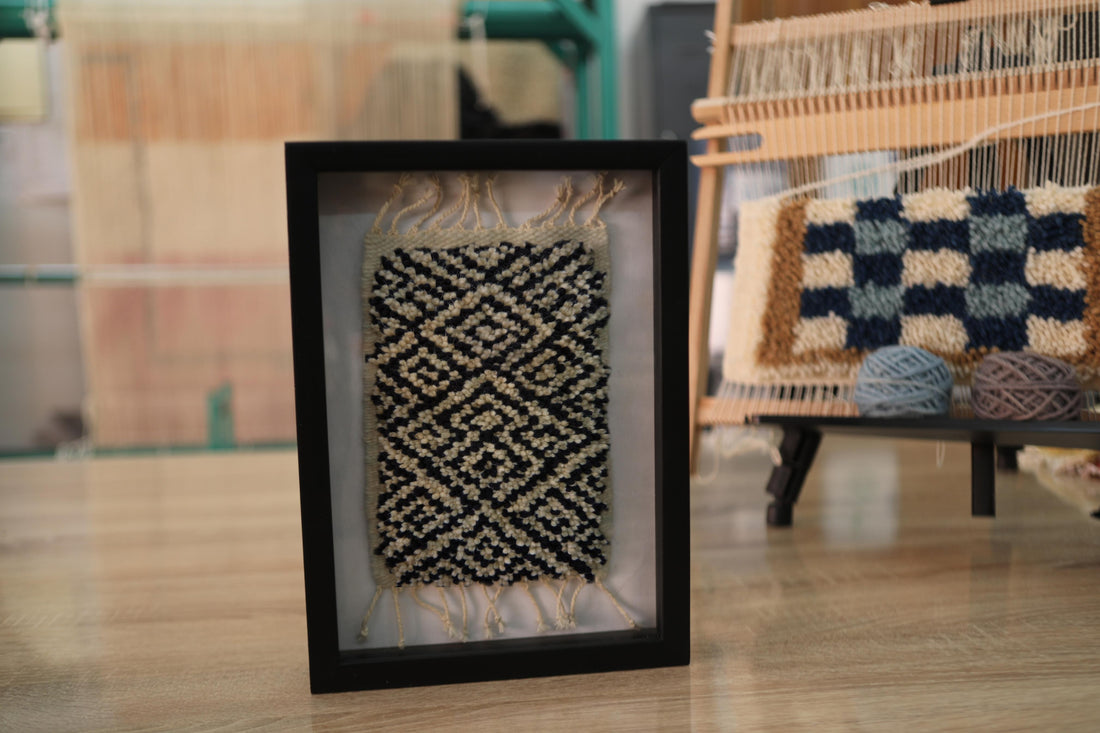 moroccan rug, diamond rug art, black ivory wool, wall hanging decor, hand knotted textile, framed rug miniature, artisan moroccan decor, knot by knot weaving, rug wall piece