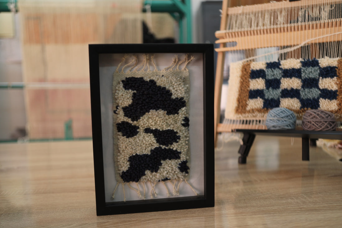 Handmade Moroccan Rug Wall Art – Organic Abstract Patch Pattern – Black & Cream Wool – Framed Berber Textile – Earthy Boho Decor