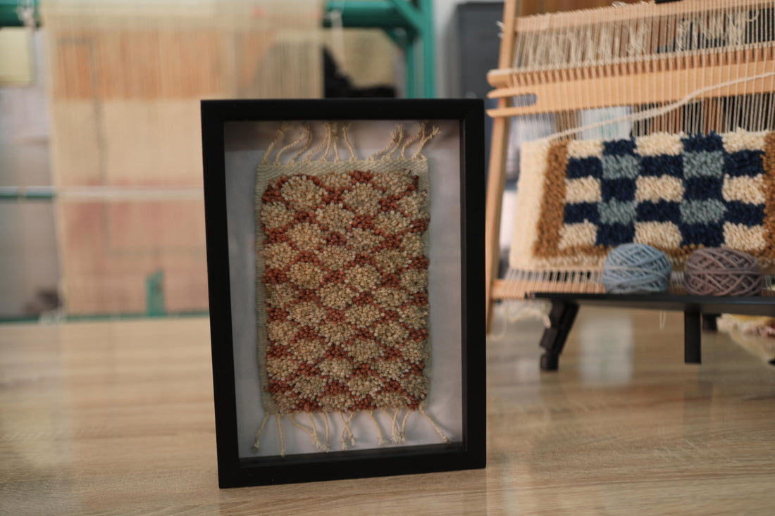 Handwoven Wool Wall Art – Framed Circular Motif Tapestry in Earth Tones (25x31cm)