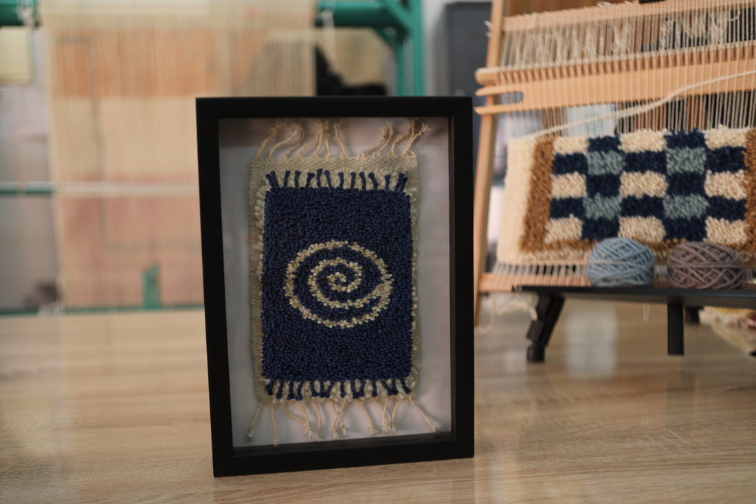 Framed Spiral Handwoven Wool Wall Art – Navy & Beige Swirl Pattern (25x31cm)