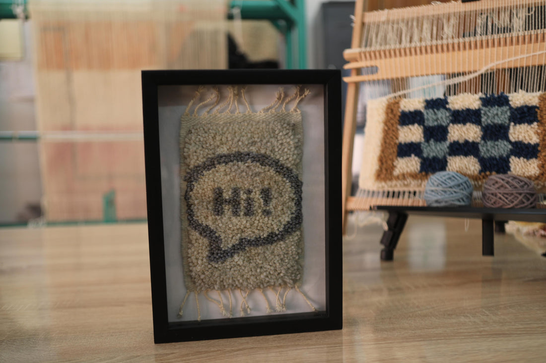 Beige Moroccan Rug Wall Art with Black “Hi!” – Framed Handwoven Mini Wool Tapestry