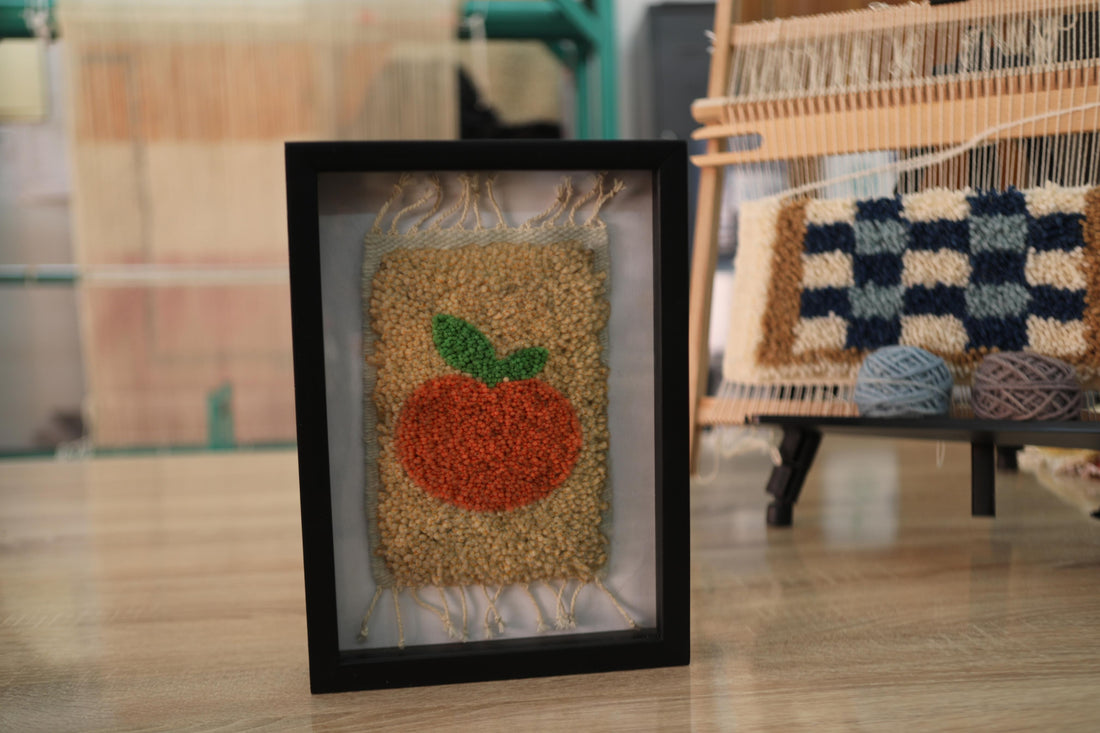 Framed Moroccan Rug Pumpkin Wall Hanging – Handmade Textile Art with Green Leaf