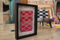 Framed, Moroccan rug, wall art, diamond pattern, red wool, beige wool, black shadow box, handmade, textile wall decor, boho style, living room art
