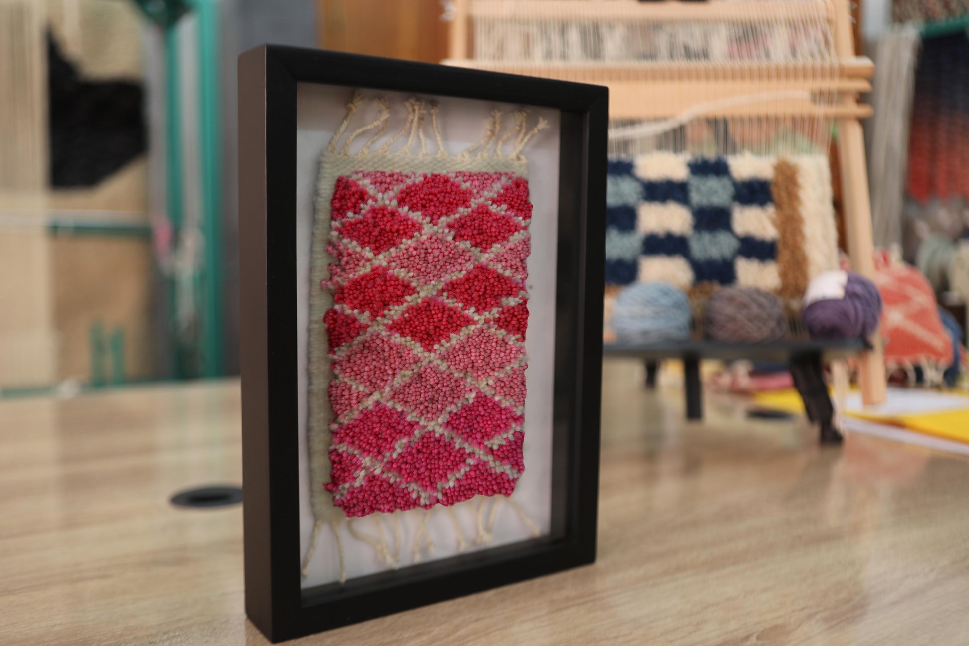 Framed, Moroccan rug, wall art, diamond pattern, red wool, beige wool, black shadow box, handmade, textile wall decor, boho style, living room art
