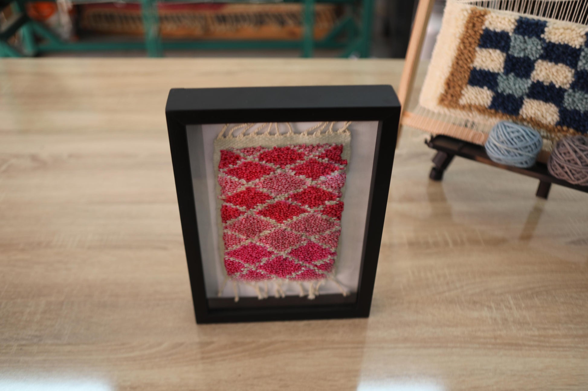 Framed, Moroccan rug, wall art, diamond pattern, red wool, beige wool, black shadow box, handmade, textile wall decor, boho style, living room art
