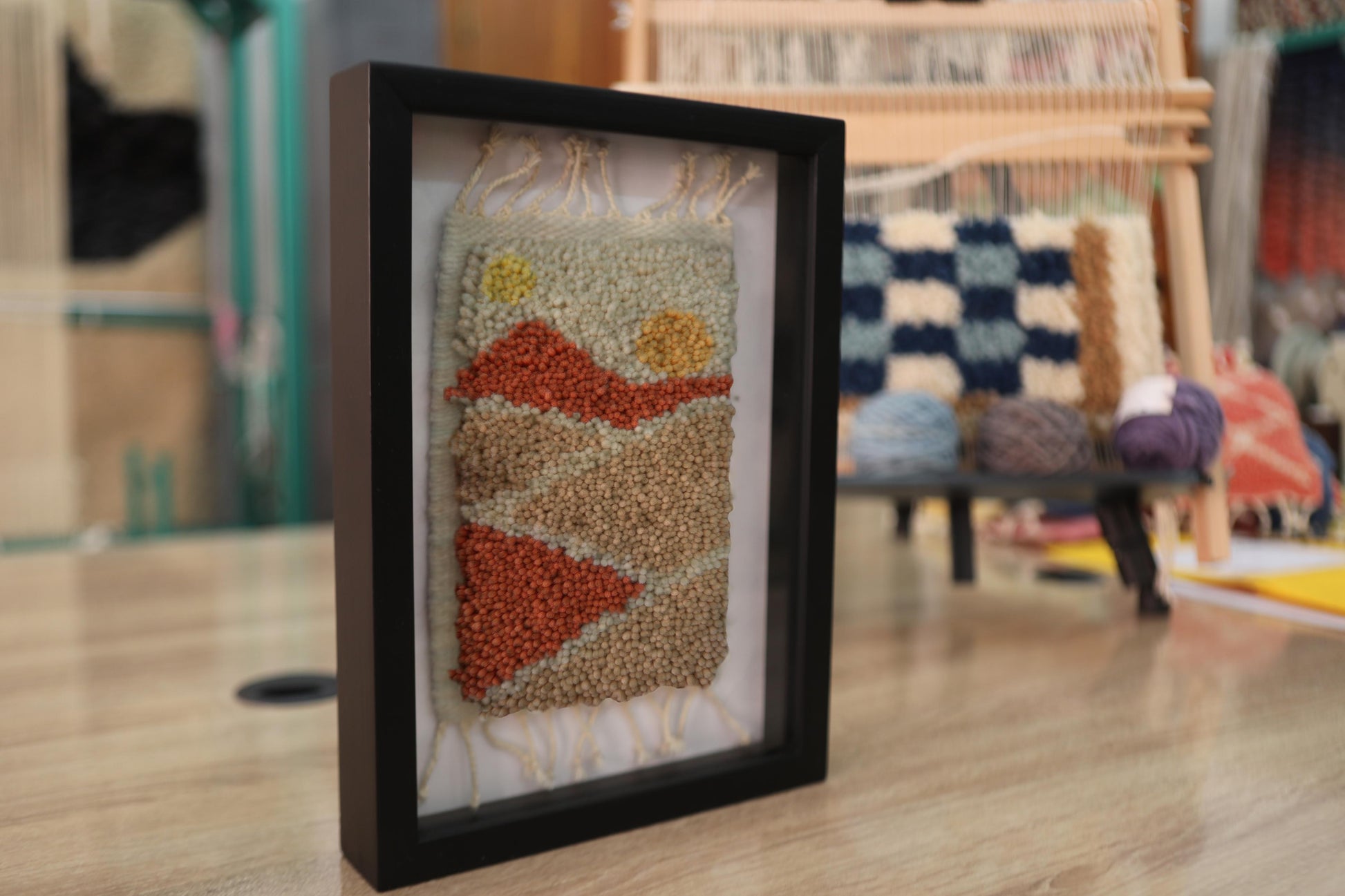 Moroccan rug, dual sun wall art, framed wool tapestry, hand-knotted rug decor, desert mountain wall hanging, boho home art, knot by knot Moroccan textile, artisan wool weaving, small Moroccan wall rug, 25x31 cm framed artwork, sunrise sunset decor, wool landscape piece
