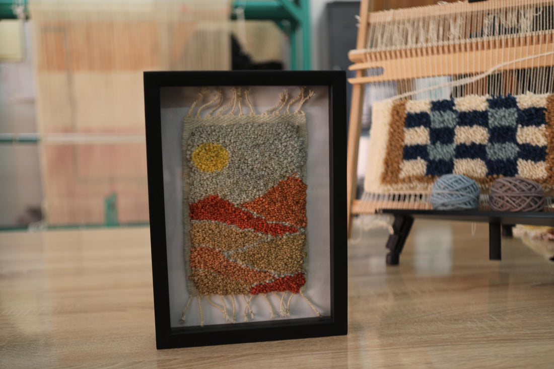 Moroccan rug, framed wool wall art, sunset desert tapestry, hand-knotted Moroccan textile, boho decor, wool landscape artwork, Berber weaving, shadow box rug, handmade Moroccan rug art, earth tone wall hanging, artisanal rug design, knot by knot rug, 25x31cm framed rug, woven Moroccan wall decor
