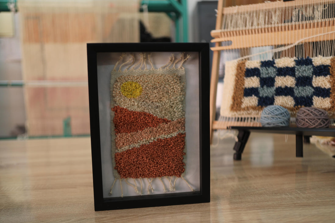 Moroccan rug, sunrise desert wall art, framed wool tapestry, hand-knotted wool wall hanging, Berber weaving, artisanal Moroccan rug, handmade rug art, knot by knot Moroccan textile, 25x31cm framed rug, earth tone wall decor, boho desert decor, Moroccan craftsmanship, wool fiber art, rustic framed rug
