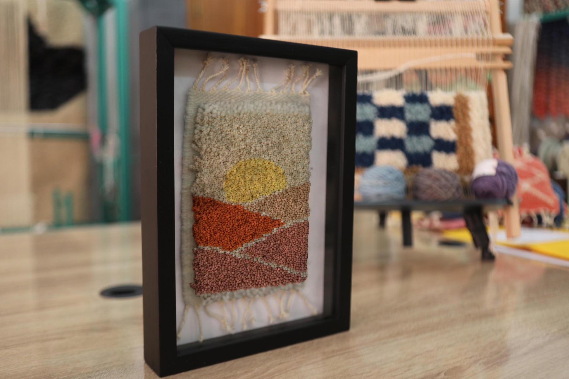 Moroccan rug, sunset wall art, hand-tufted rug, wool landscape textile, framed Moroccan decor, desert sunset art, boho home wall decor, Berber wool weaving, shadow box rug art, handmade Moroccan rug, sunrise art, artisan textile frame, modern Moroccan wall hanging