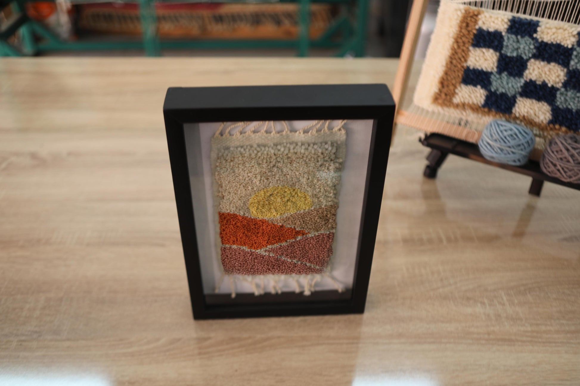 Moroccan rug, sunset wall art, hand-tufted rug, wool landscape textile, framed Moroccan decor, desert sunset art, boho home wall decor, Berber wool weaving, shadow box rug art, handmade Moroccan rug, sunrise art, artisan textile frame, modern Moroccan wall hanging