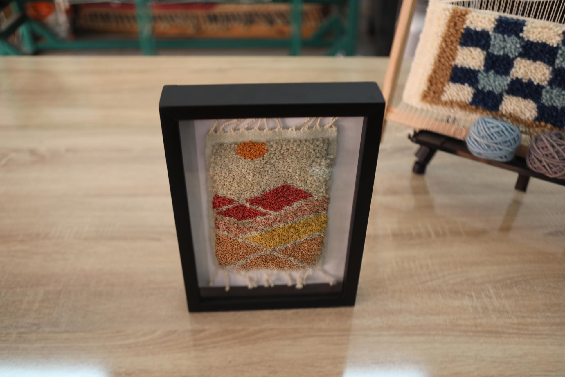 abstract moroccan rug, mini wool rug art, hand knotted wall hanging, warm earth tone rug, framed moroccan textile, 25x31 cm rug art, knot by knot handmade rug, moroccan rug miniature, modern moroccan decor, artisan wool weaving, landscape style wool wall piece
