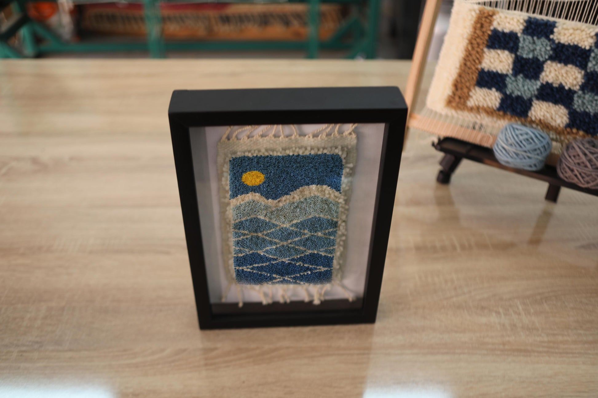 blue moroccan rug, ocean mini rug wall art, framed wool landscape, handmade blue tapestry, knot by knot moroccan art, coastal wool wall decor, abstract sun and sea rug, 25x31 cm framed textile, oceanic moroccan rug