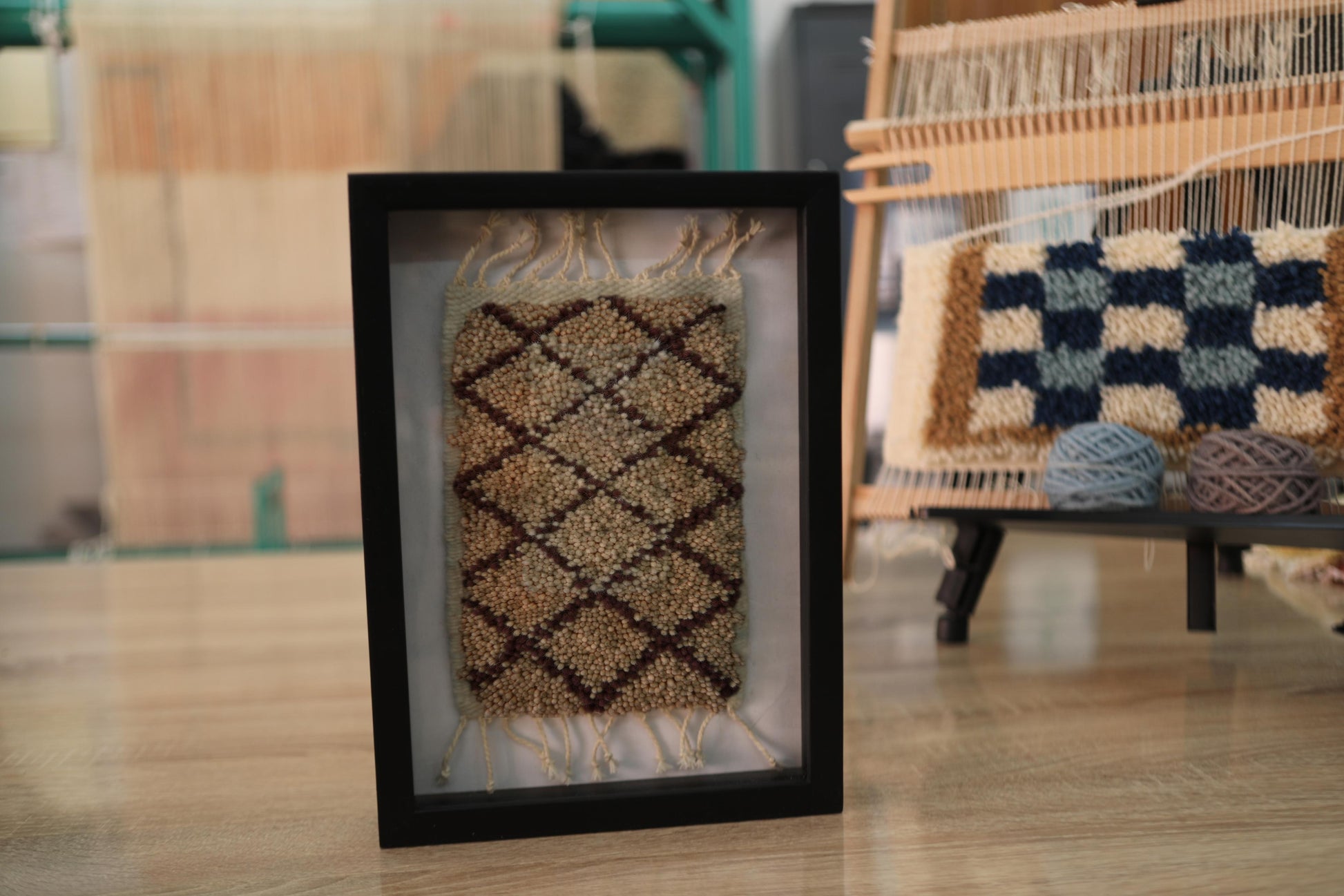 diamond lattice rug, moroccan rug, black and beige wool wall art, hand knotted textile, knot by knot framed rug, geometric pattern art, tribal decor, mini tapestry, artisan wool design, 25x31 cm rug
