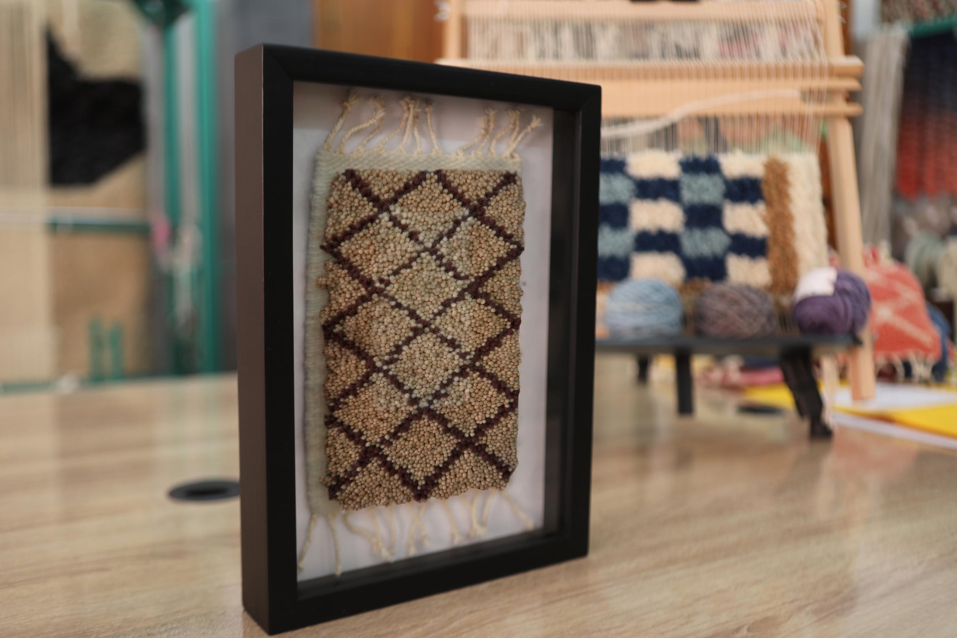 diamond lattice rug, moroccan rug, black and beige wool wall art, hand knotted textile, knot by knot framed rug, geometric pattern art, tribal decor, mini tapestry, artisan wool design, 25x31 cm rug
