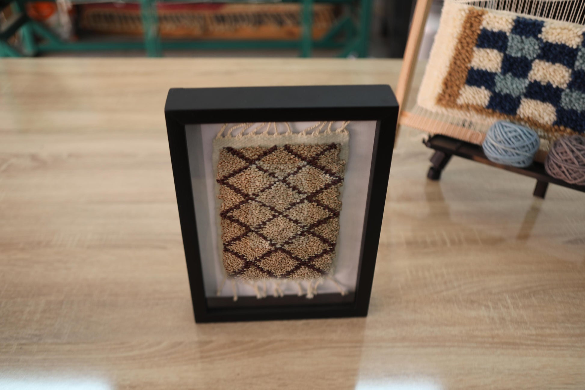 diamond lattice rug, moroccan rug, black and beige wool wall art, hand knotted textile, knot by knot framed rug, geometric pattern art, tribal decor, mini tapestry, artisan wool design, 25x31 cm rug
