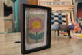 flower wall art, moroccan rug, hand-knotted flower rug, colorful wool wall hanging, framed flower decor, pastel floral textile art, handmade moroccan wall piece, pink yellow flower rug, knot by knot tapestry, boho flower art
