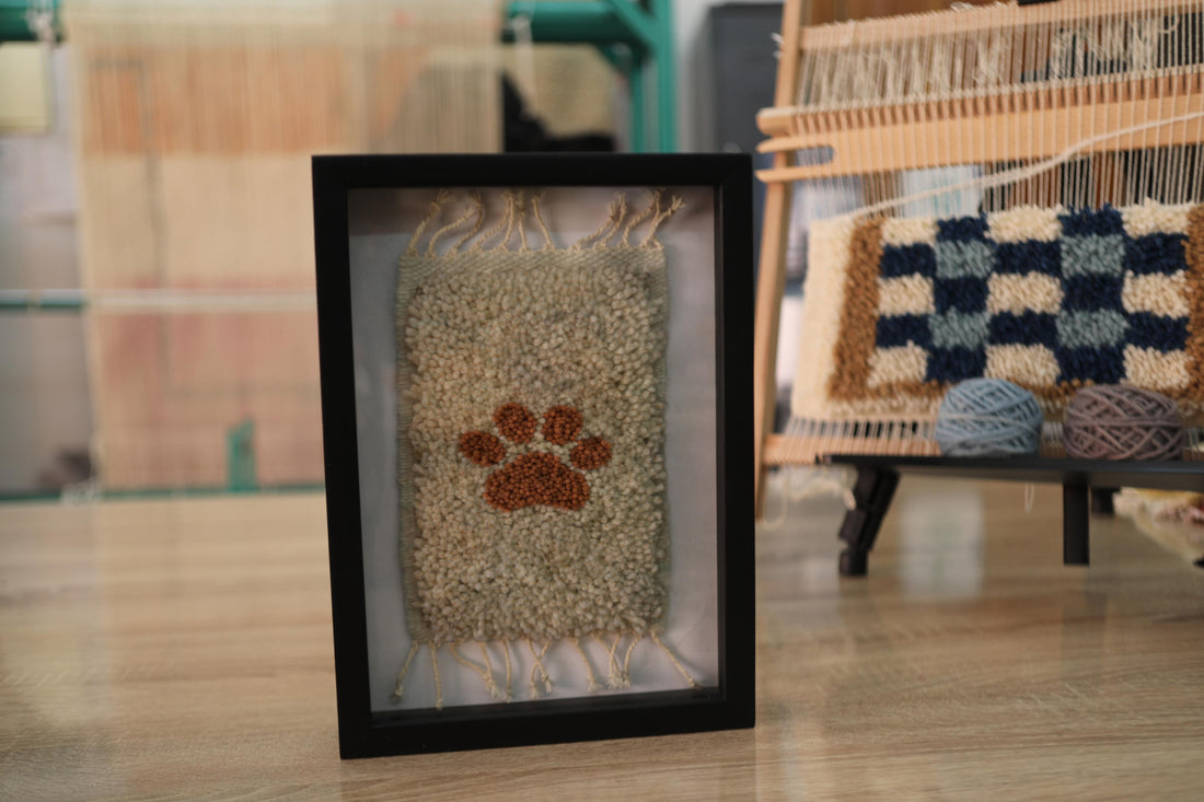 hand-knotted mini rug, paw print moroccan rug, pet lover wall decor, framed wool rug, artisan moroccan wall hanging, knot by knot weaving, moroccan handmade rug, dog memorial decor, boho paw print art, 25x31 cm
