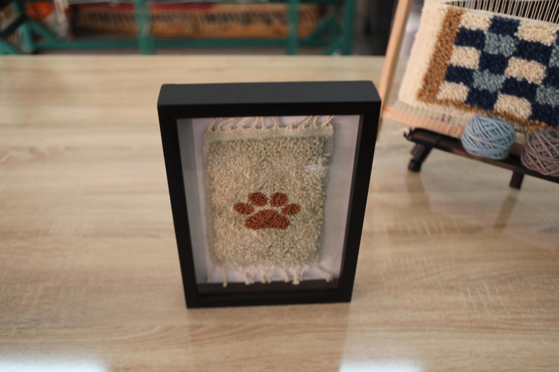 hand-knotted mini rug, paw print moroccan rug, pet lover wall decor, framed wool rug, artisan moroccan wall hanging, knot by knot weaving, moroccan handmade rug, dog memorial decor, boho paw print art, 25x31 cm
