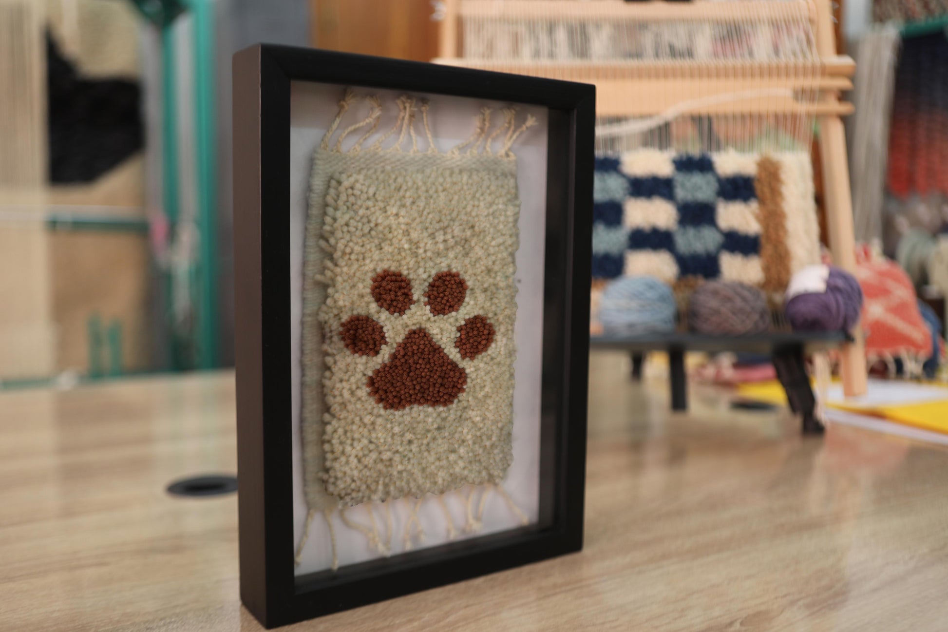 handmade moroccan rug, paw print wall art, dog paw decor, knot by knot rug, framed wool rug, artisan wall hanging, mini moroccan rug, pet memorial art, rustic home decor, 25x31 cm
