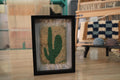 moroccan rug, cactus wall decor, green cactus art, handmade cactus rug, desert motif textile, framed mini rug, moroccan wall art, hand-knotted wool, cactus design, knot by knot rug, beige and green wall piece
