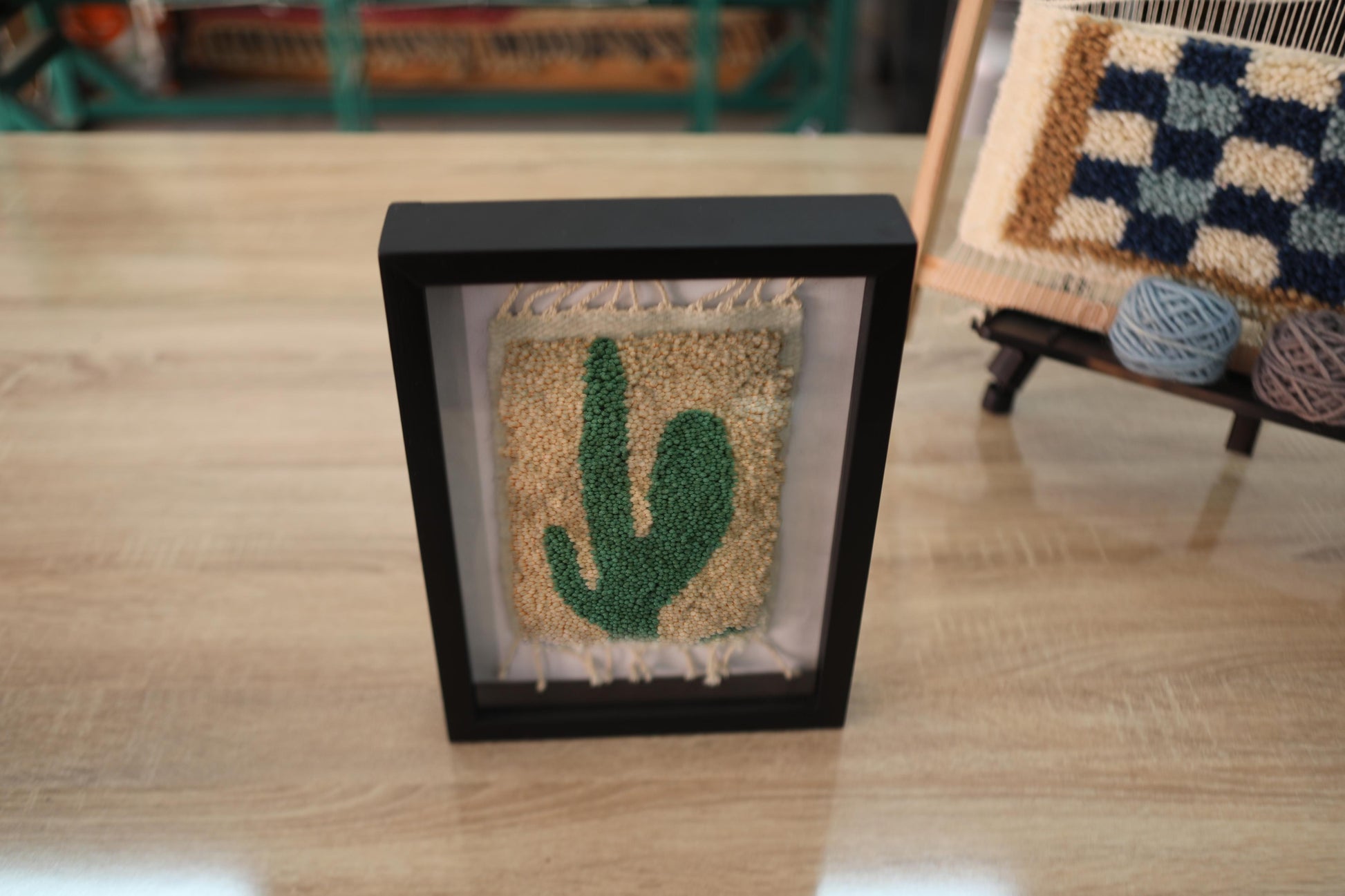 moroccan rug, cactus wall decor, green cactus art, handmade cactus rug, desert motif textile, framed mini rug, moroccan wall art, hand-knotted wool, cactus design, knot by knot rug, beige and green wall piece
