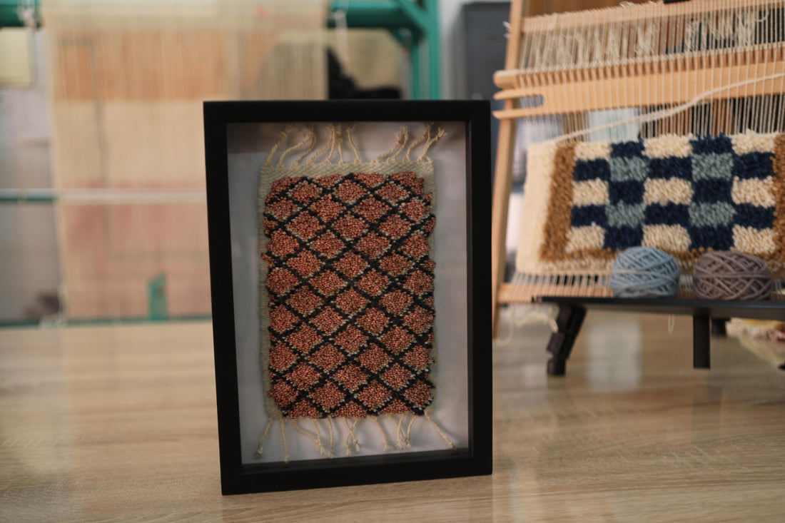 moroccan rug, coral and black rug, framed textile art, handmade moroccan rug, mini rug wall hanging, berber pattern, hand-knotted moroccan rug, artisan weaving, wool rug decor, knot by knot rug
