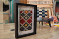 moroccan rug, framed mini rug, multicolor diamond pattern, tribal textile art, wall decor, hand-knotted wool rug, red yellow grey black rug, artisan moroccan rug, boho moroccan wall hanging, knot by knot moroccan weaving