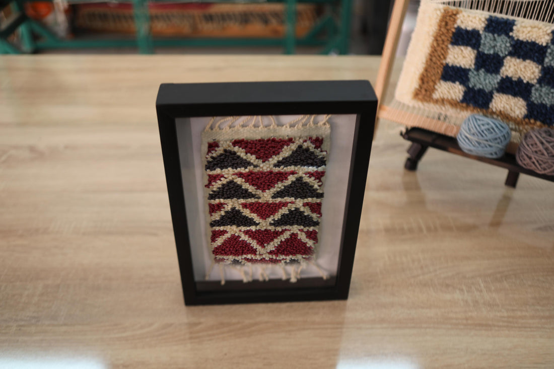 moroccan rug, framed wall art, geometric wool design, hand-knotted mini rug, traditional moroccan pattern, red and black rug, home decor tapestry, small wool rug, knot by knot artwork
