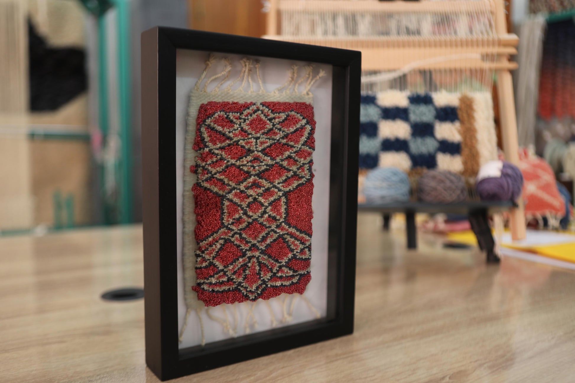 moroccan rug, framed wool rug, red olive rug art, geometric moroccan pattern, hand knotted mini rug, boho decor, artisan moroccan textile, small wool wall art, knot by knot rug, moroccan craft wall hanging
