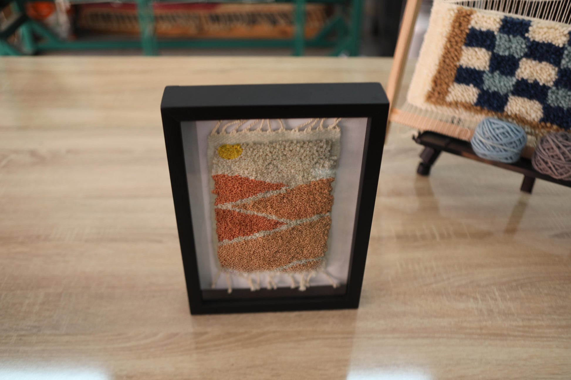 moroccan rug, geometric wool wall art, knot by knot handmade rug, desert inspired wall tapestry, framed rug art, artisan moroccan decor, modern boho wall textile, wool wall hanging, 25x31 cm rug, hand-knotted moroccan rug wall art
