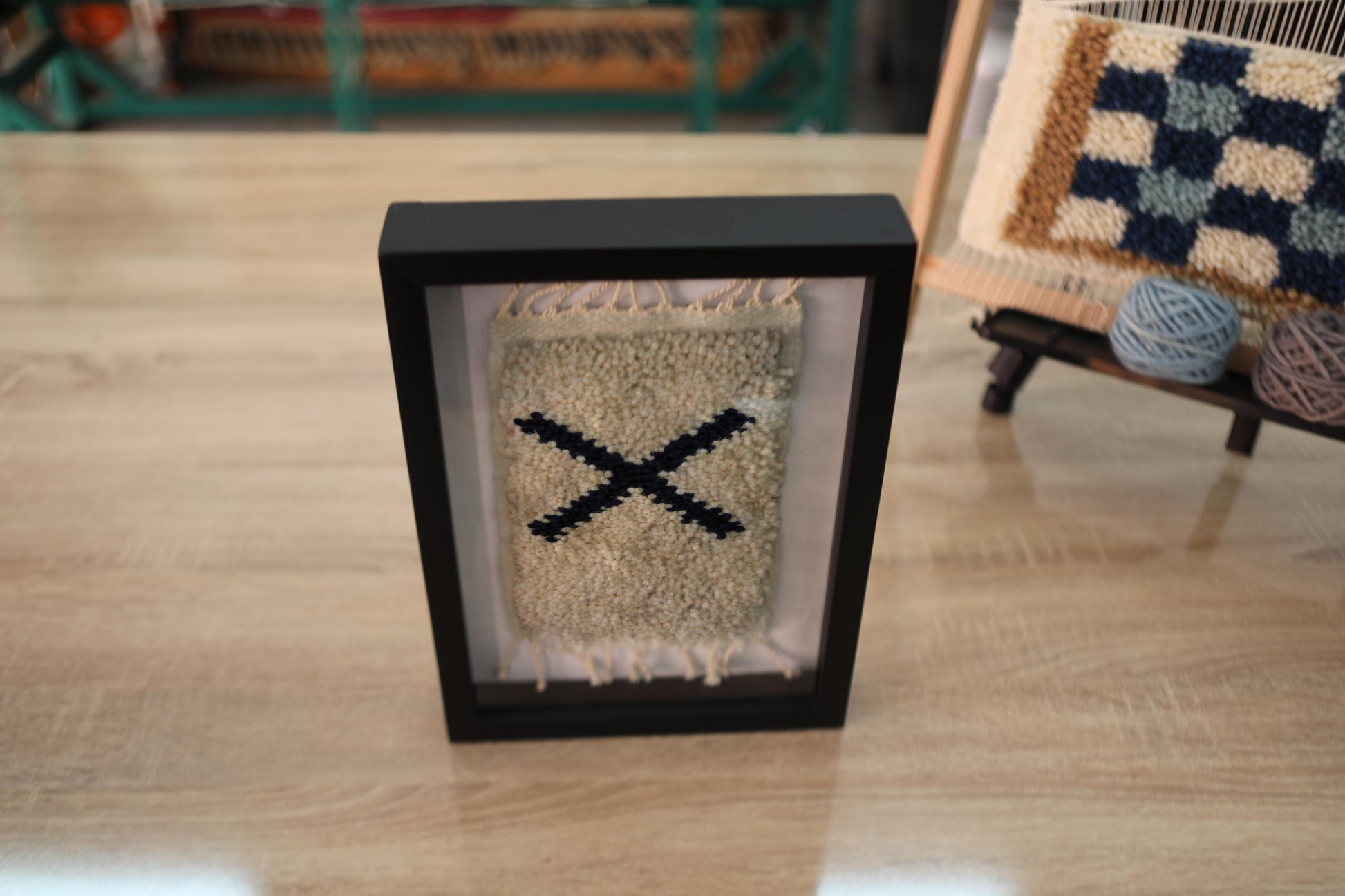 moroccan rug, hand-knotted rug wall art, boho wall decor, chevron rug art, black and cream textile, artisan moroccan wall hanging, mini rug art, wool moroccan rug, framed handmade decor, knot by knot rug
