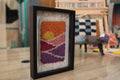 moroccan rug, hand-knotted wall art, sunrise rug tapestry, abstract moroccan design, framed mini rug, knot by knot textile, boho home decor, wool and cotton wall hanging, 25x31 cm
