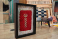 moroccan rug, hand-knotted wool rug, symbolic motif rug, vertical pattern red rug, framed moroccan wall art, tribal berber rug miniature, knot by knot rug weaving, artisan wool framed textile, boho decor wall hanging, moroccan wool weaving

