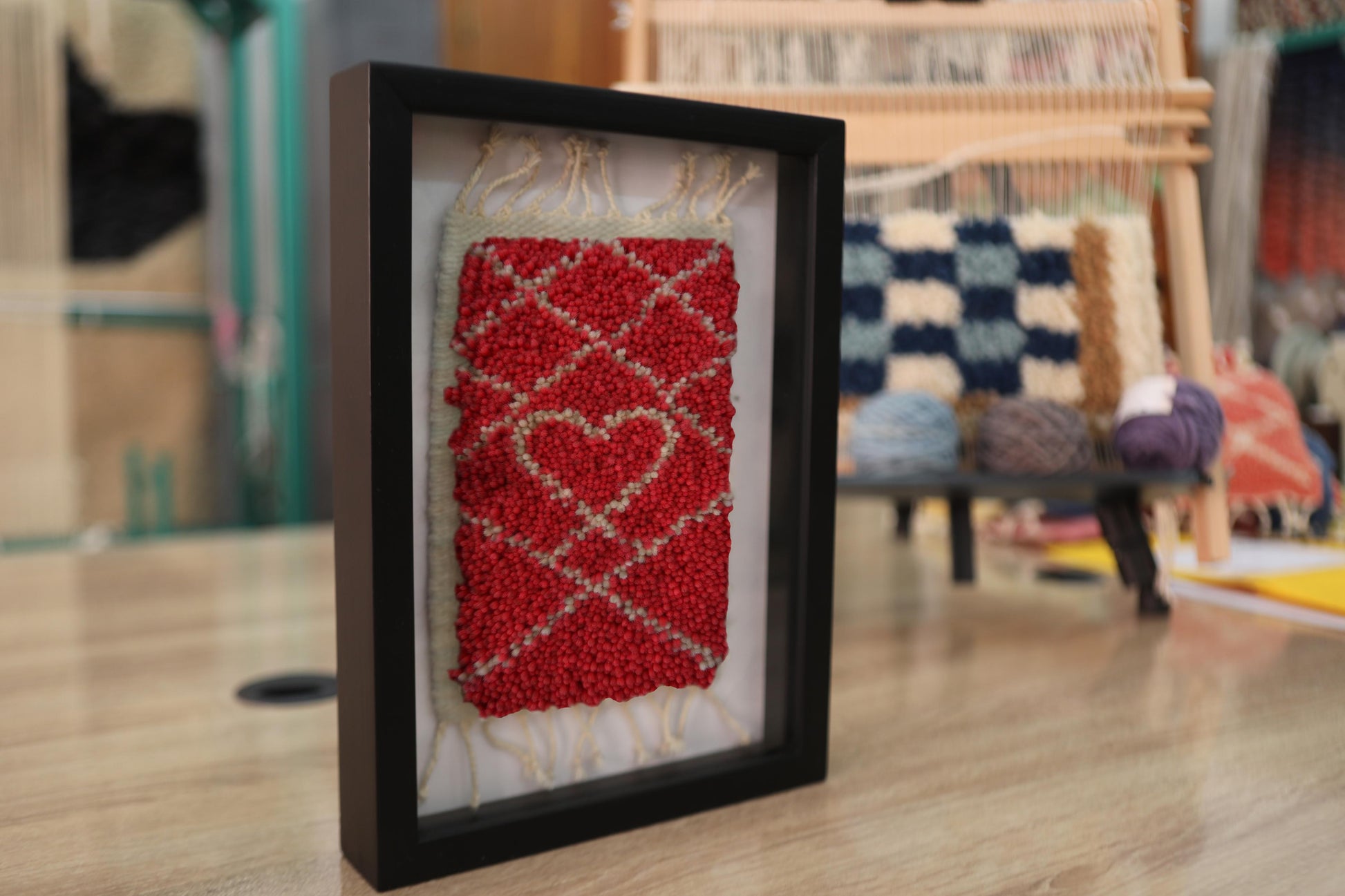 moroccan rug, heart motif rug, hand knotted wall art, red and beige rug, love symbol rug, boho decor, berber textile, framed moroccan rug, wool wall hanging, knot by knot rug, artisan rug art
