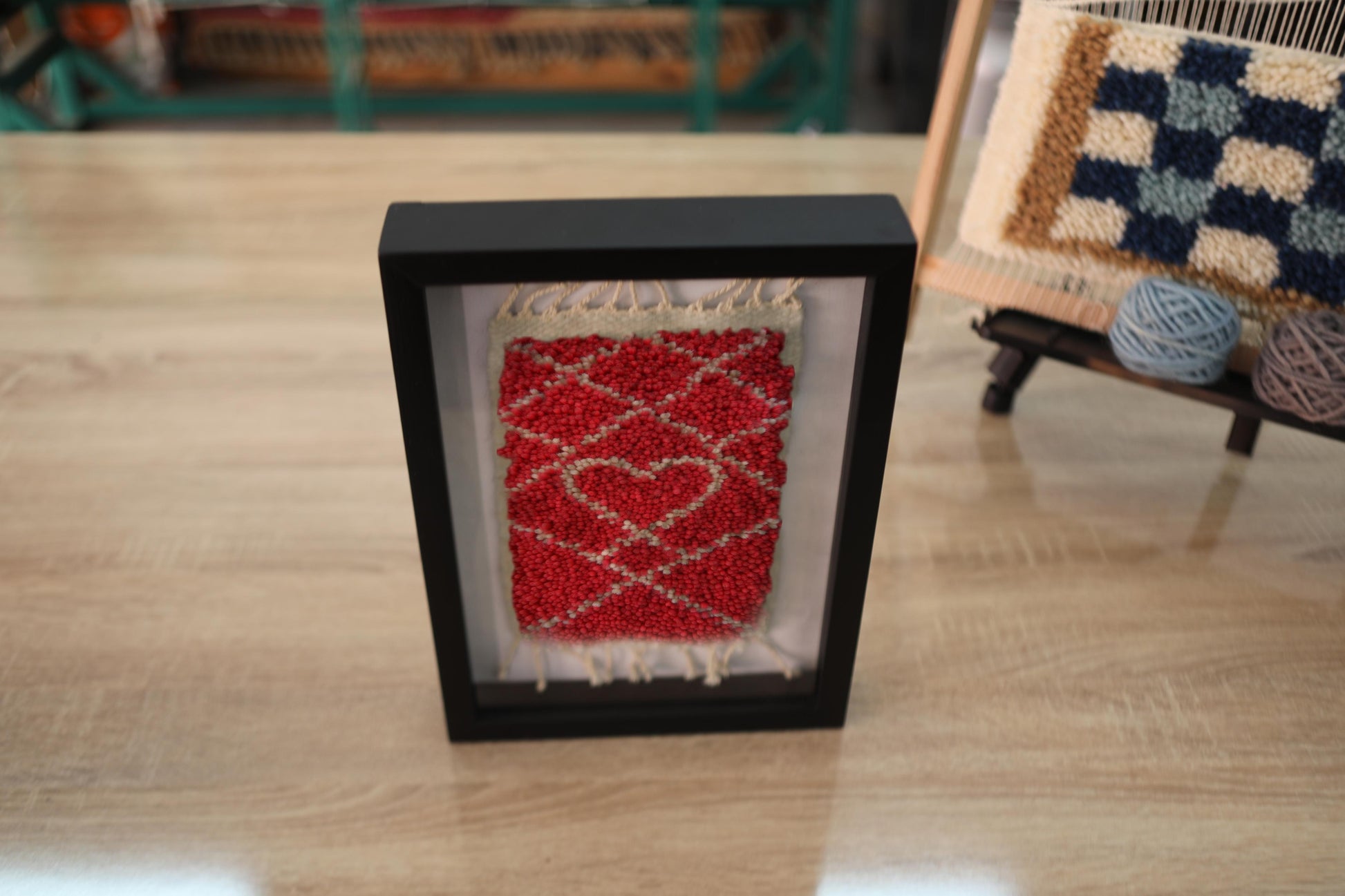 moroccan rug, heart motif rug, hand knotted wall art, red and beige rug, love symbol rug, boho decor, berber textile, framed moroccan rug, wool wall hanging, knot by knot rug, artisan rug art
