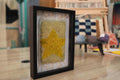 moroccan rug, hollow star wool art, framed wall hanging, hand-knotted moroccan textile, boho star rug decor, yellow and beige wool rug, knot by knot rug, kids wall art, celestial moroccan wool art, framed handmade tapestry, 25x31 cm star rug, nursery decor rug
