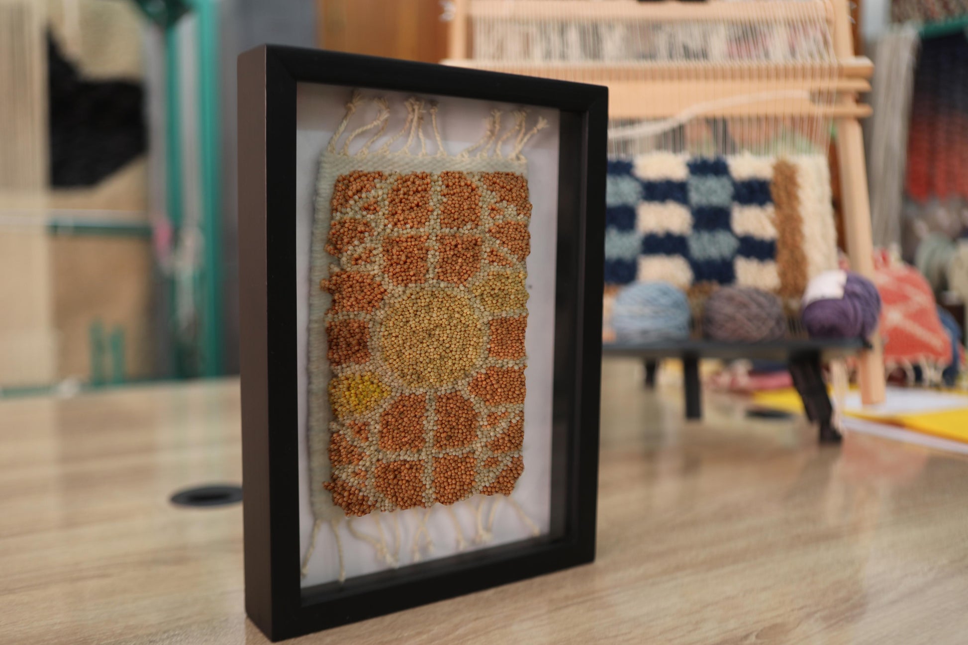 moroccan rug, medallion motif rug, framed moroccan wall art, boho wall decor, knot by knot moroccan rug, handmade mini rug, wool moroccan textile, rustic wall hanging, artisan moroccan decor, yellow center rug, 25x31 cm framed rug