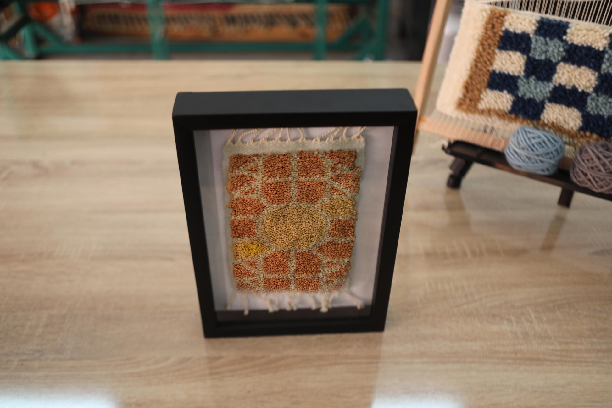 moroccan rug, medallion motif rug, framed moroccan wall art, boho wall decor, knot by knot moroccan rug, handmade mini rug, wool moroccan textile, rustic wall hanging, artisan moroccan decor, yellow center rug, 25x31 cm framed rug