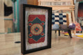 moroccan rug, medallion rug, circular rug motif, framed wool tapestry, hand knotted rug wall art, artisan moroccan weaving, red blue beige rug, mini moroccan textile, boho home decor, knot by knot weaving
