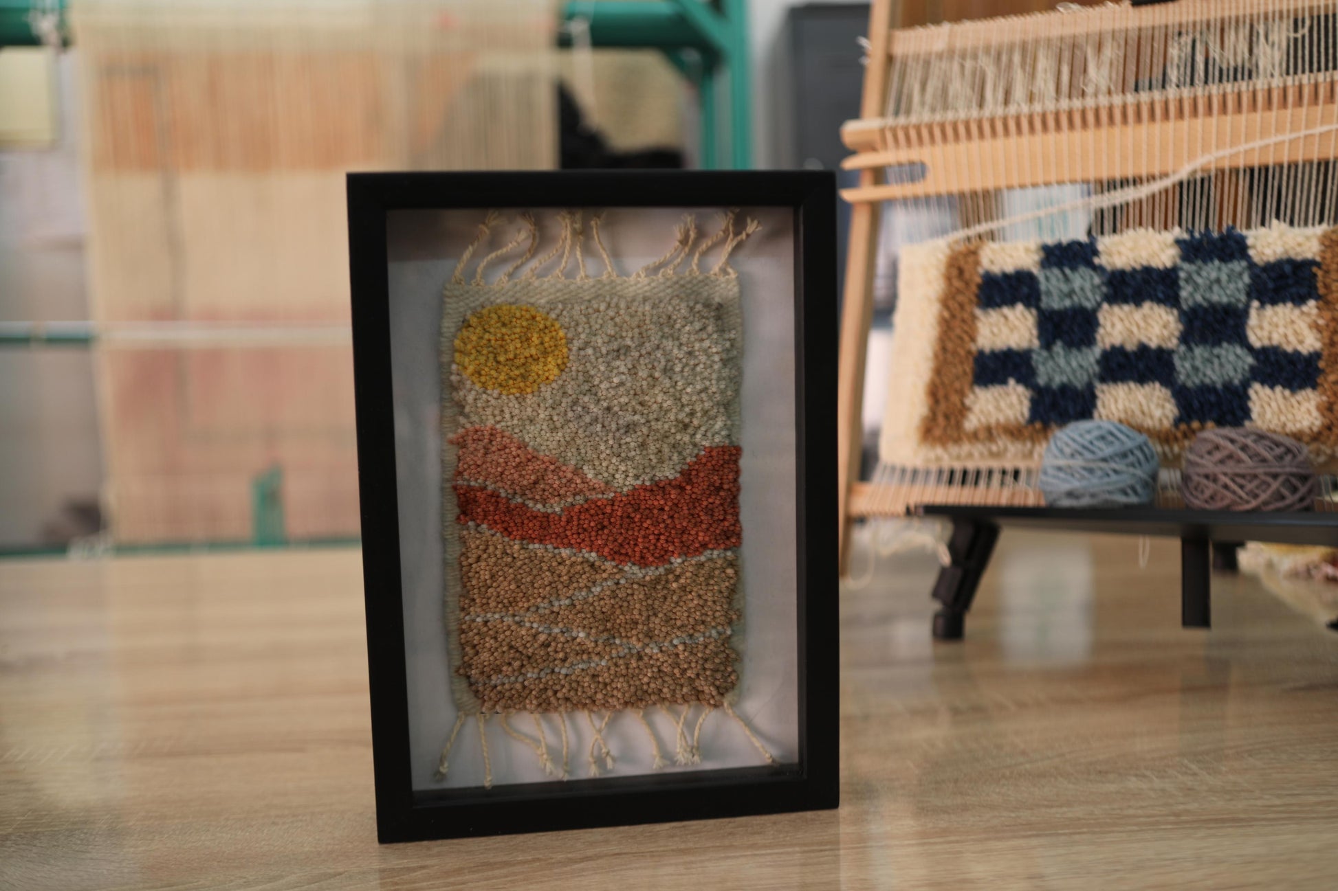 moroccan rug, mountain landscape rug, hand-knotted wool wall art, earth tone mini rug, artisan moroccan tapestry, yellow sun textile, boho moroccan decor, desert mountain wall piece, framed mini moroccan rug, knot by knot weaving, 25x31 cm
