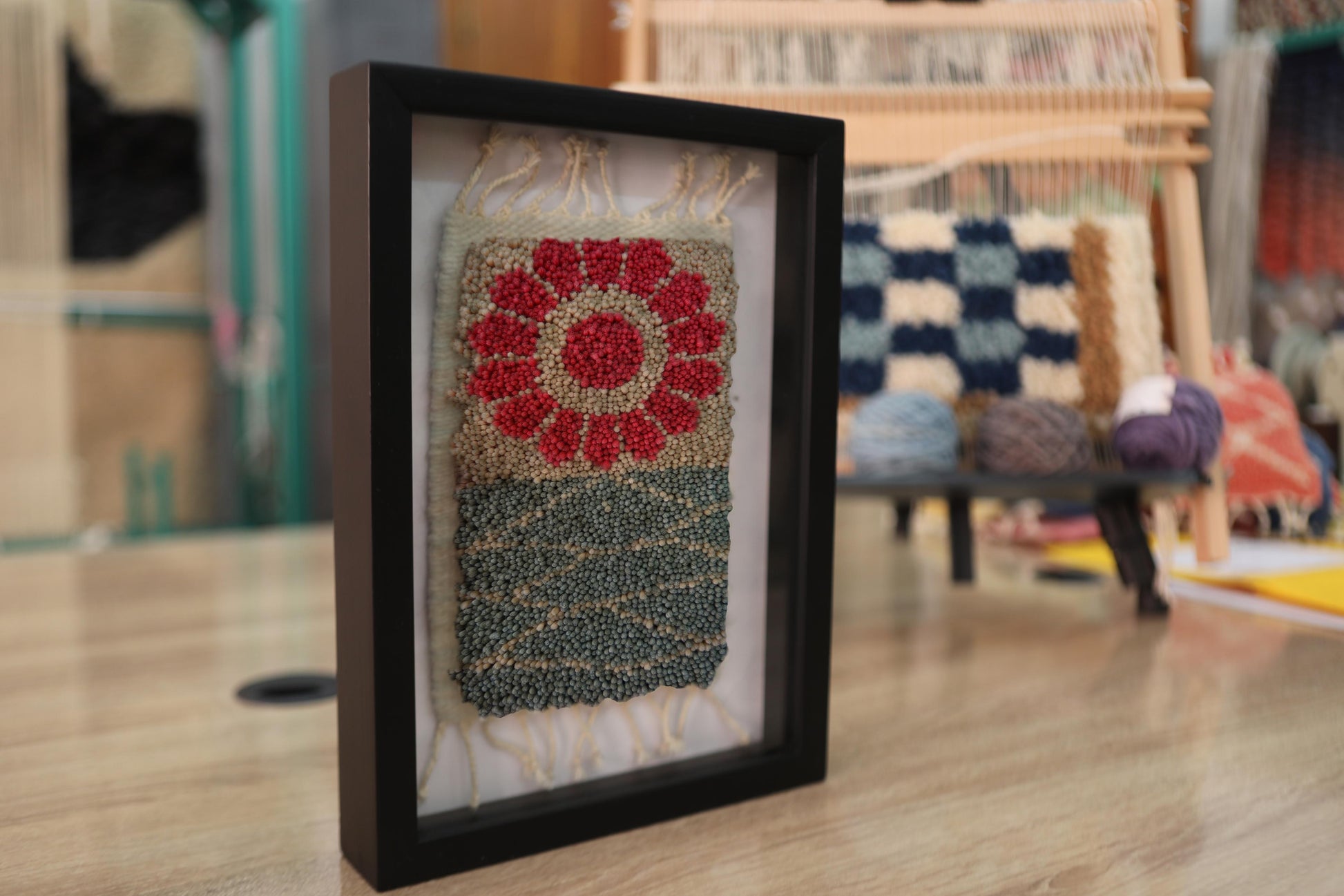 moroccan rug, red flower rug, floral wool tapestry, hand-knotted moroccan textile, mini rug wall art, framed wool decor, knot by knot rug, 25x31 cm wall hanging, artisan moroccan weaving, blooming rug pattern
