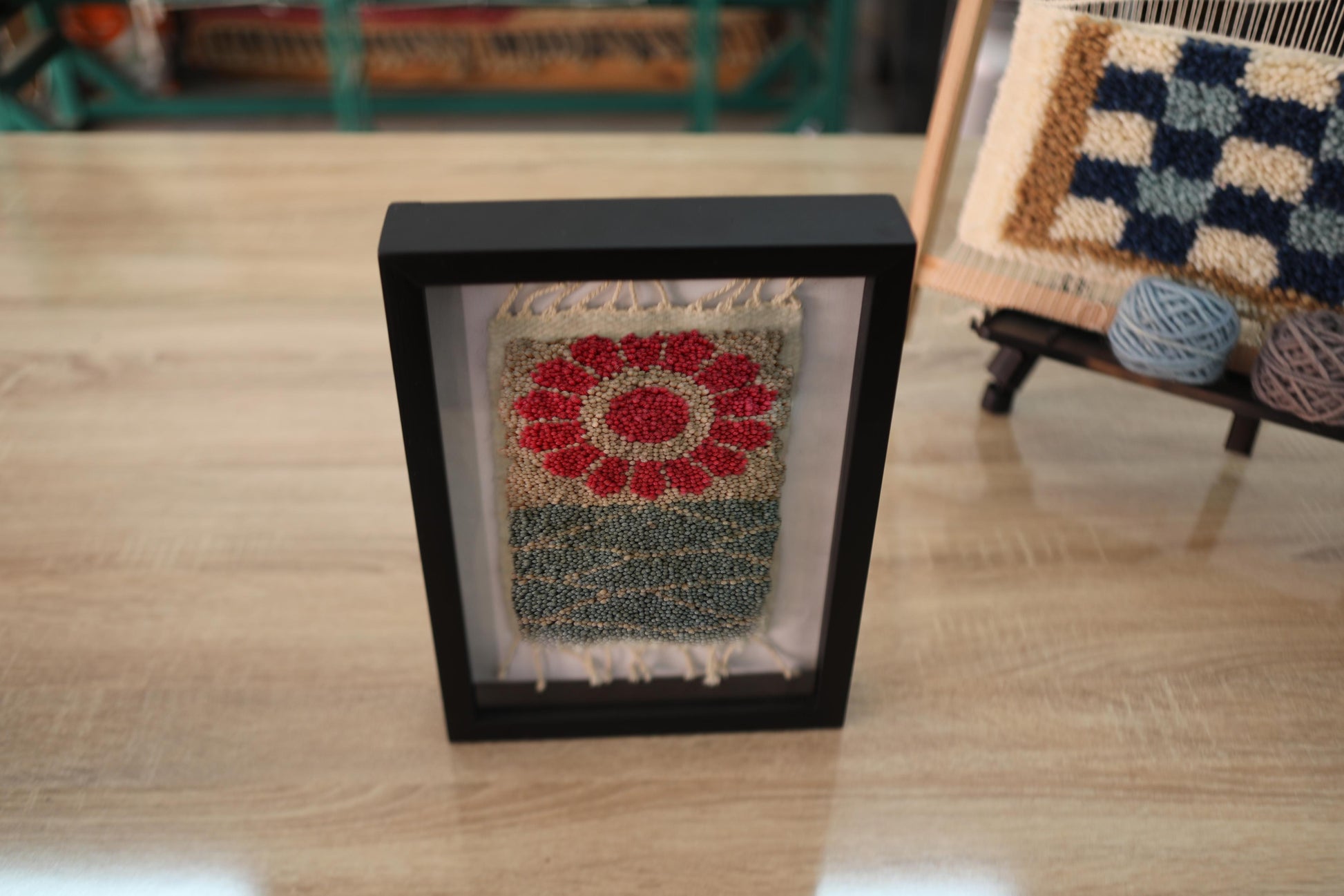 moroccan rug, red flower rug, floral wool tapestry, hand-knotted moroccan textile, mini rug wall art, framed wool decor, knot by knot rug, 25x31 cm wall hanging, artisan moroccan weaving, blooming rug pattern
