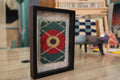 moroccan rug, red flower rug, framed wool tapestry, hand knotted rug art, green wall decor, artisan rug weaving, knot by knot textile, mini moroccan wall hanging, floral rug design
