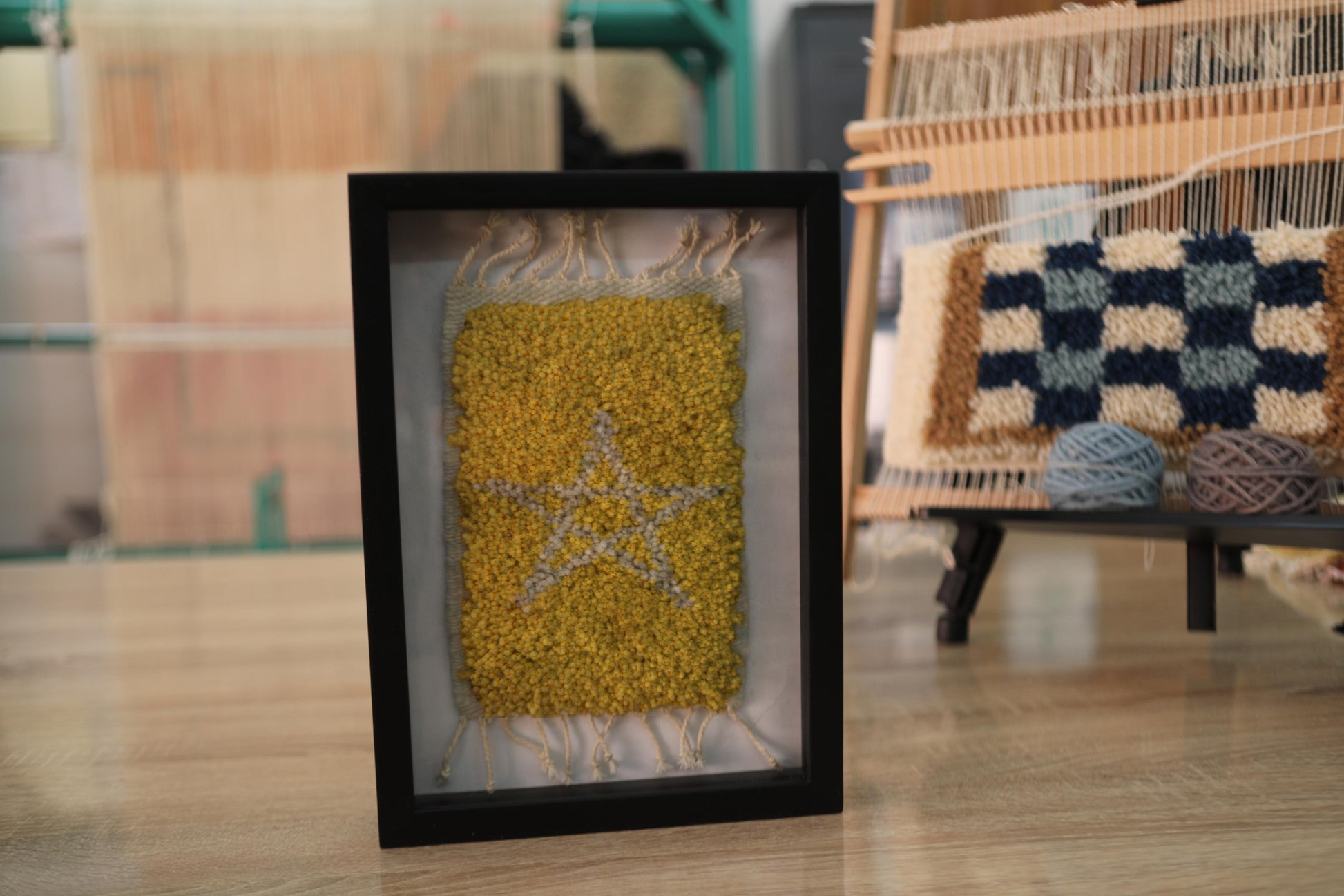 moroccan rug, star outline rug, hand-knotted wool wall art, yellow wool moroccan textile, knot by knot rug, celestial star wall decor, modern nursery rug, boho wool tapestry, framed star moroccan art, handmade wool artwork, wool star wall hanging, 25x31 cm rug art
