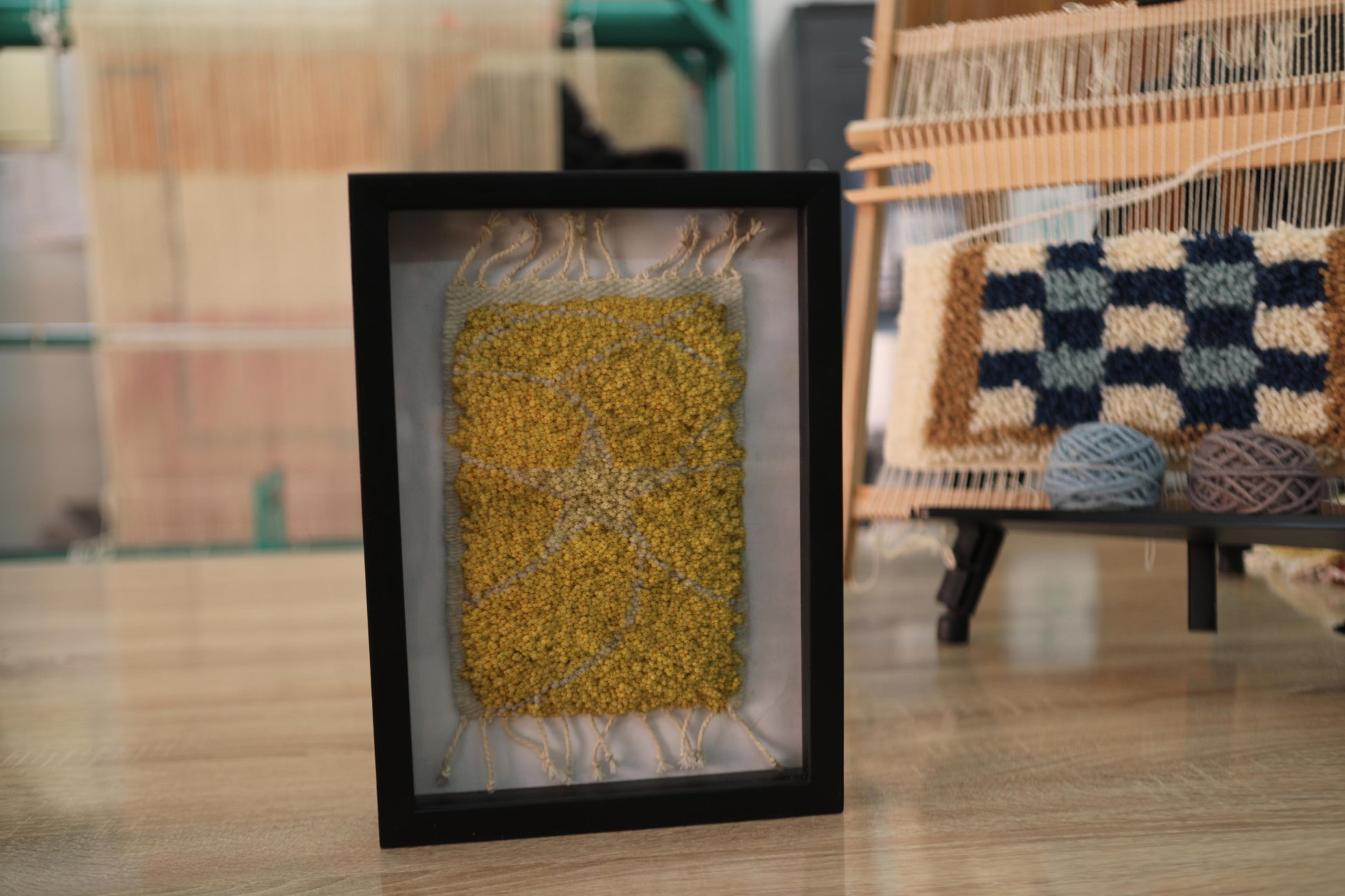 moroccan rug, sunburst rug, yellow starburst art, hand-knotted wool wall art, knot by knot moroccan textile, celestial wool tapestry, boho star wall decor, framed moroccan rug art, handmade wool starburst rug, wool star wall hanging, 25x31 cm wall rug
