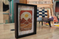 moroccan rug, sunburst wall art, hand-knotted tapestry, wool landscape rug, framed fiber art, desert textile art, handmade moroccan decor, knot by knot weaving, 25x31 cm rug art, boho wall hanging, modern moroccan wall art, earth tone wool rug
