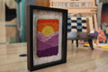 moroccan rug, sunrise wall tapestry, hand-knotted wall art, framed rug decor, geometric mountain textile, boho home wall hanging, pink purple orange yellow rug, handmade rug art, 25x31 cm
