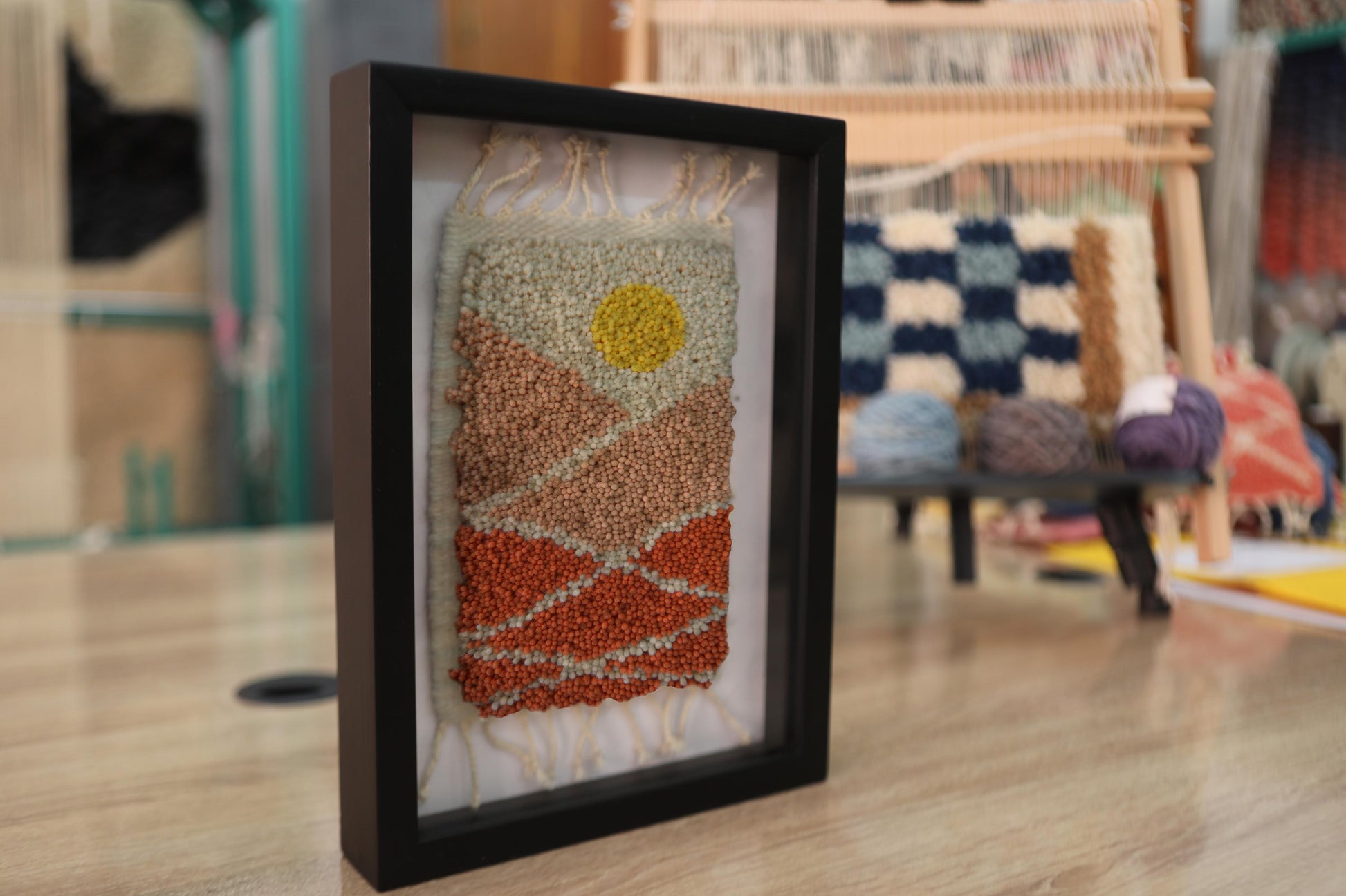 moroccan rug, sunset moroccan rug, desert art textile, hand-knotted wool wall decor, framed mini rug, sun motif rug, earth tone moroccan tapestry, handmade rug wall art, moroccan wool wall piece, knot by knot moroccan rug, 25x31 cm textile
