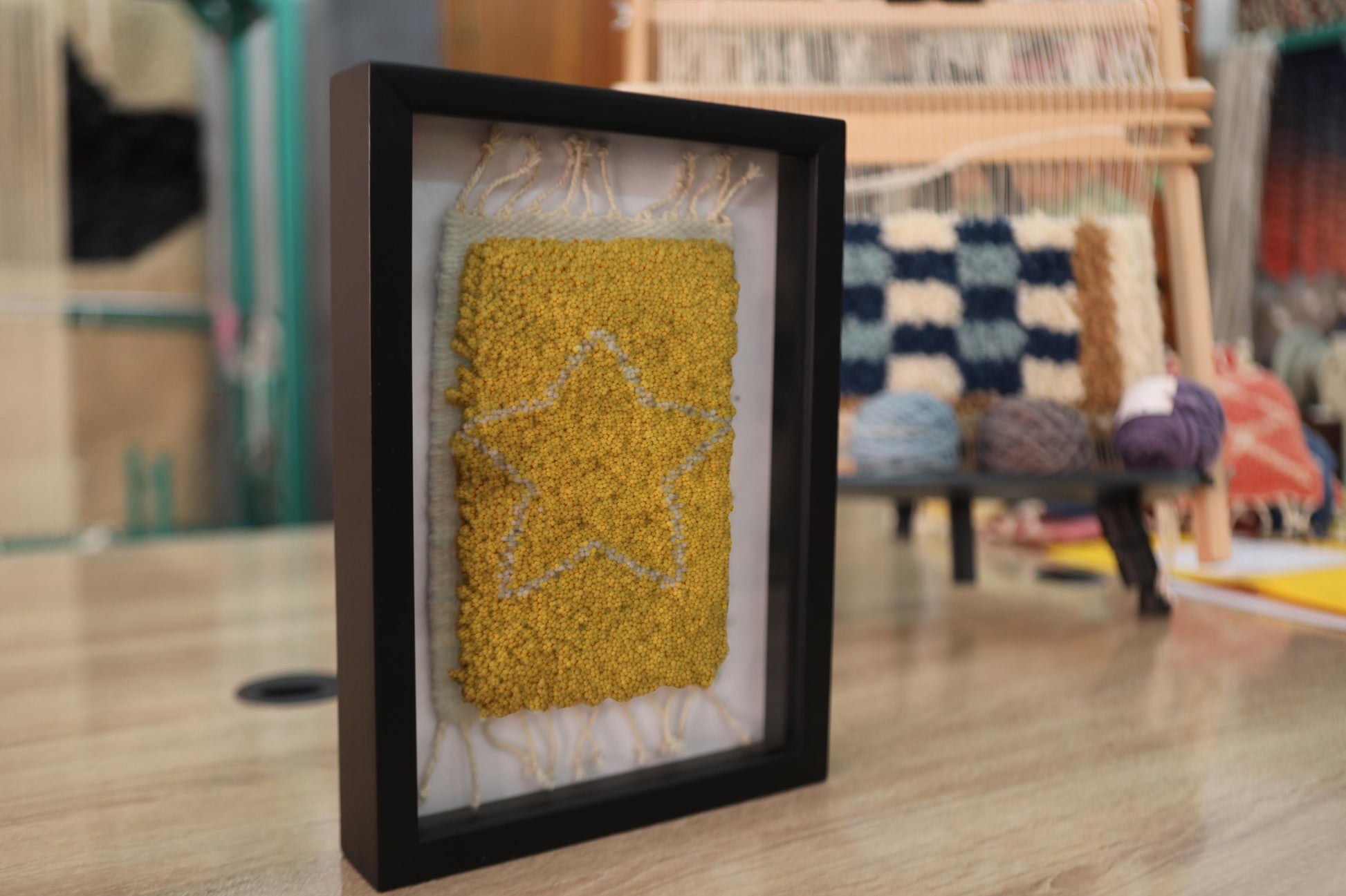 moroccan rug, yellow wool wall art, starburst rug, hand-knotted wool rug, boho framed tapestry, celestial decor, handmade rug wall hanging, knot by knot moroccan rug, modern moroccan textile, framed starburst wall piece, small rug tapestry, 25x31 cm
